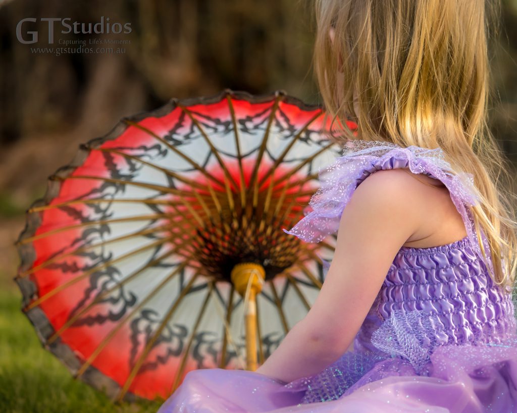 Girl with red parasol