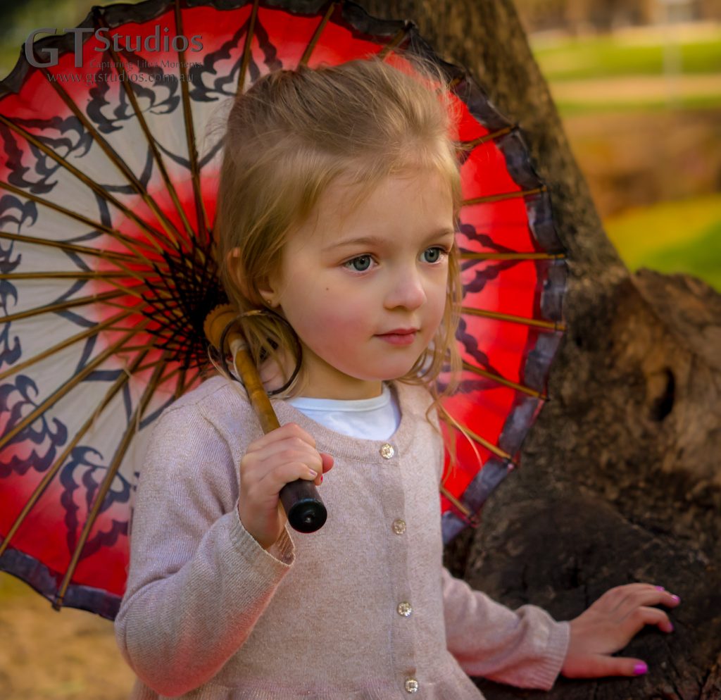 Girl with red parasol